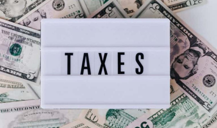 How Do Taxes Factor into Workers’ Compensation?