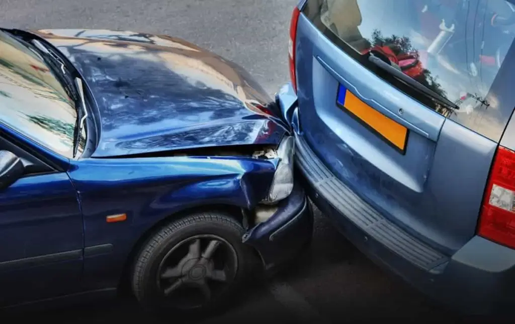 Two blue cars crashed each other. A lawyer is needed after a car accident in Illinois.