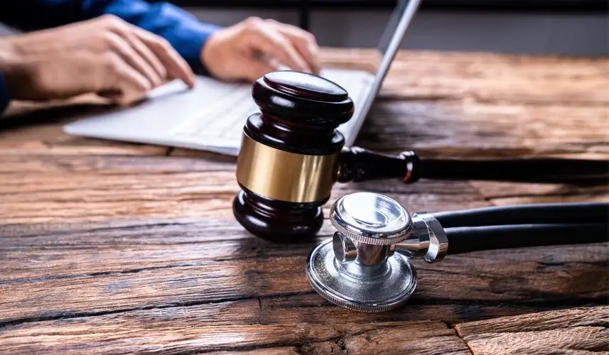 A gavel and stethoscope, find justice for medical malpractice.