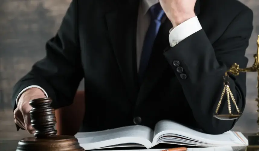 A judge holding a gavel.