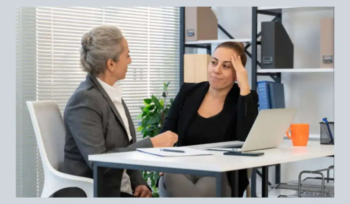 An employee reporting safety concerns at work to a lawyer for legal guidance, highlighting the importance of reporting workplace safety issues.