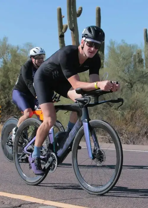 Anthony Ivone competing in the Arizona triathlon during the cycling segment.