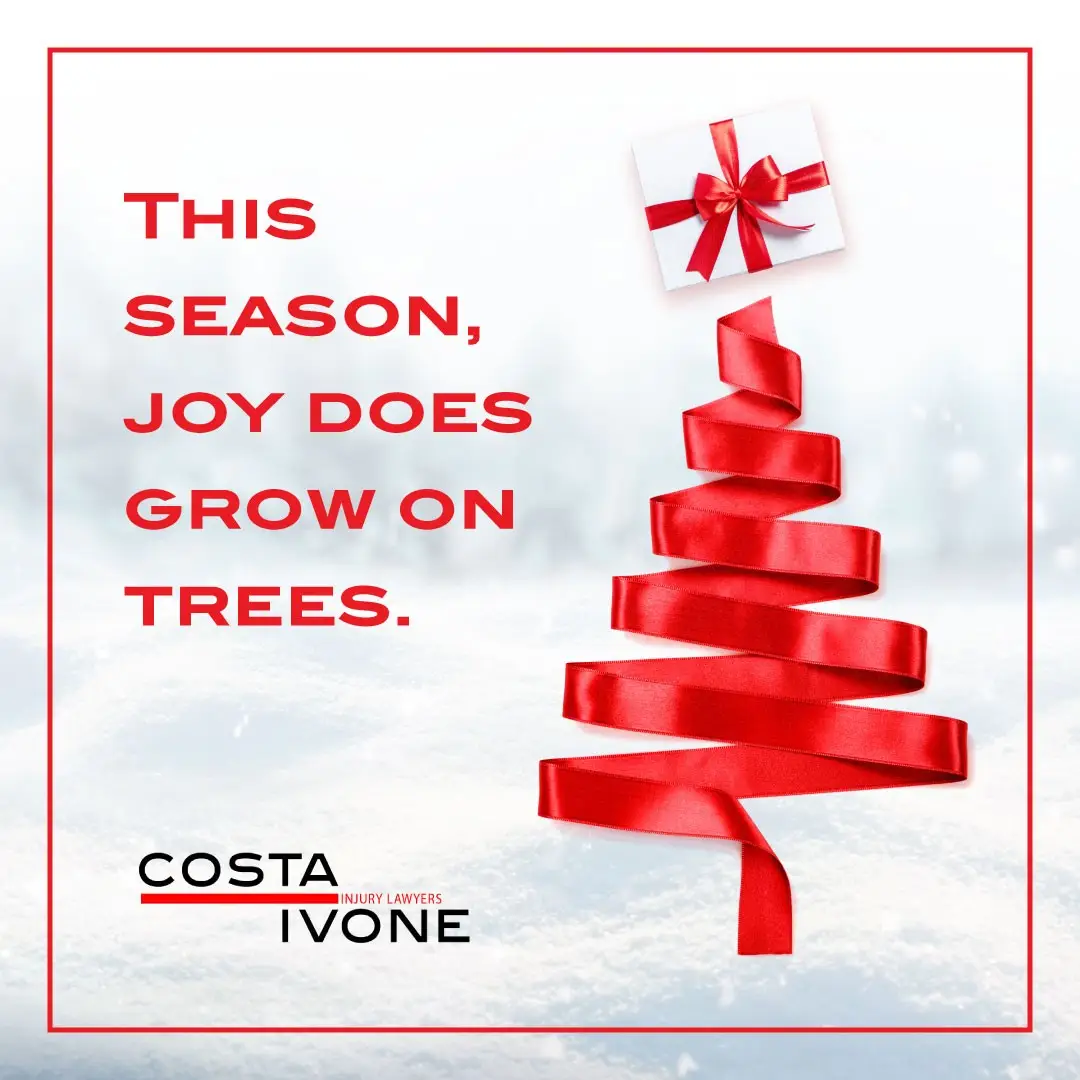 Red ribbon holiday tree with a gift on top promoting Costa Ivone Injury Lawyers Giving Tree Initiative.